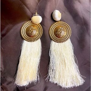 Long string tassel button earrings